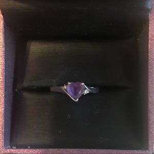 Gordon’s purple heart ring with two small diamonds